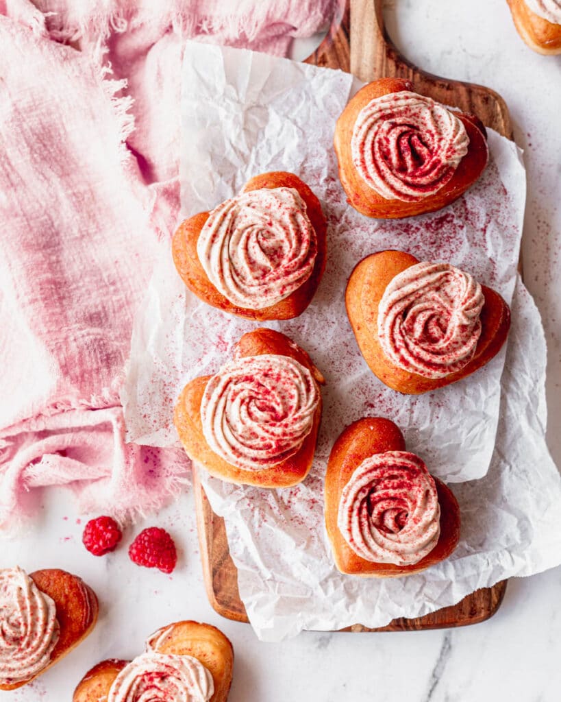raspberry custard heart donuts on tray