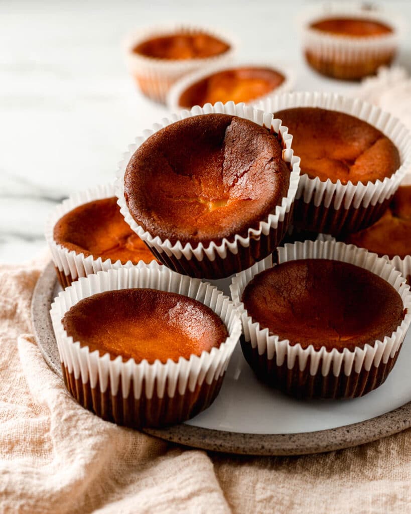 plate of mini basque cheesecakes