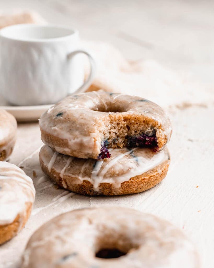 stack of baked blueberry donuts