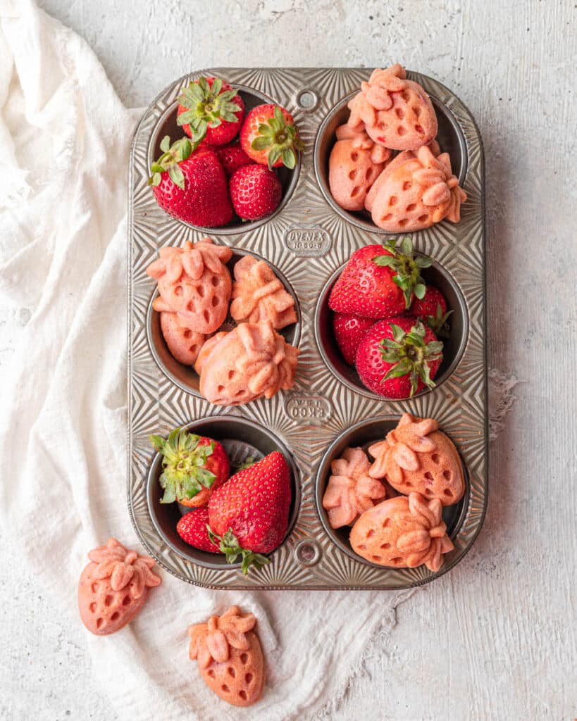 strawberry mochi muffins in tin