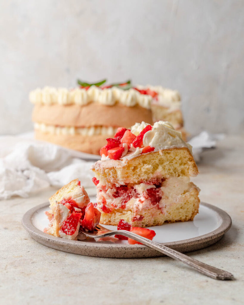 slice of strawberry cake with fork