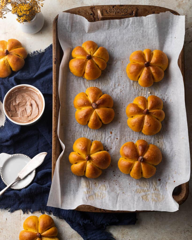 tray of pumpkin bread rolls