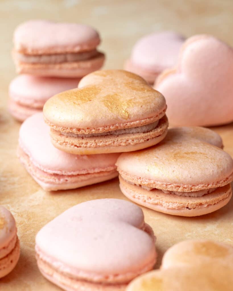 Heart macarons with ruby chocolate filling
